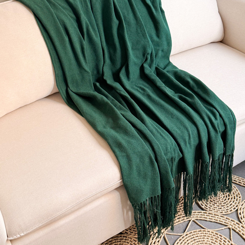 manta-decorativa-artesanal-verde-sofá